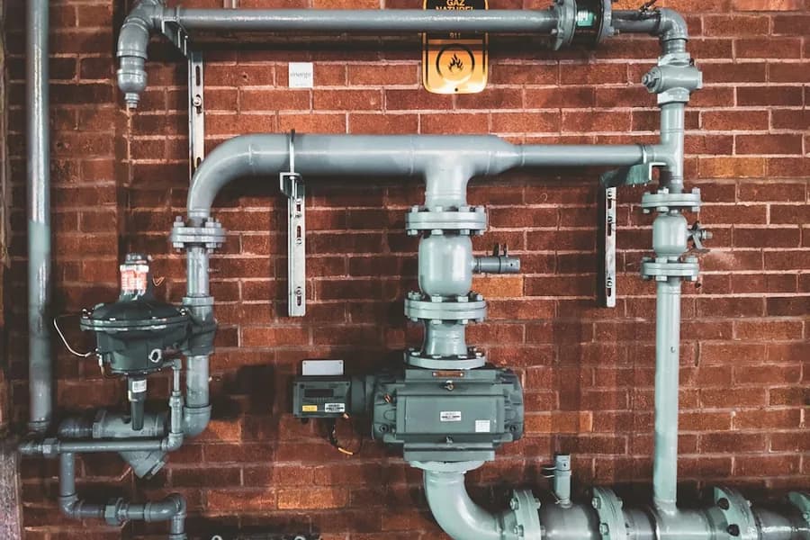 Actuated control valve installed on process pipework